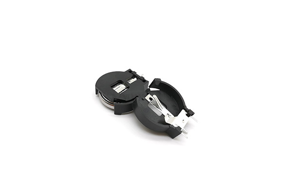 The role of the battery holder in a coin cell battery